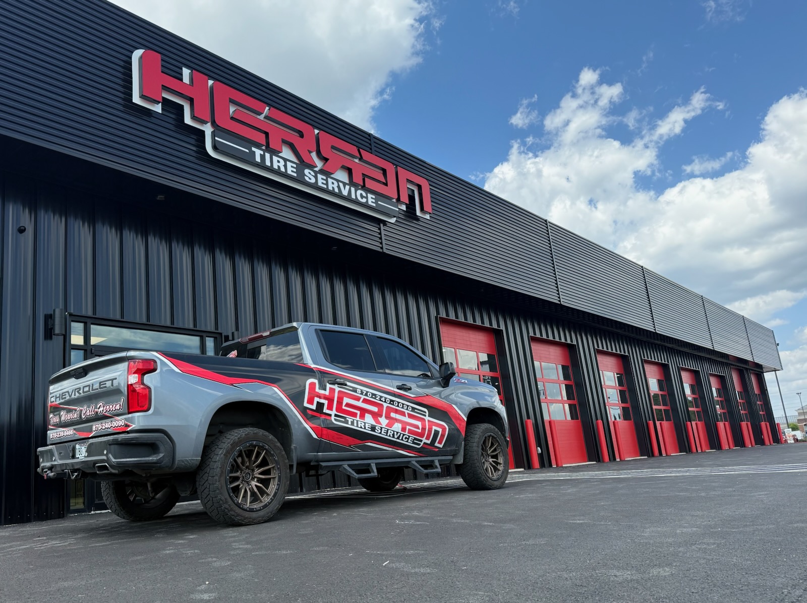 Herren Tire Service - Brookland storefront with service truck
