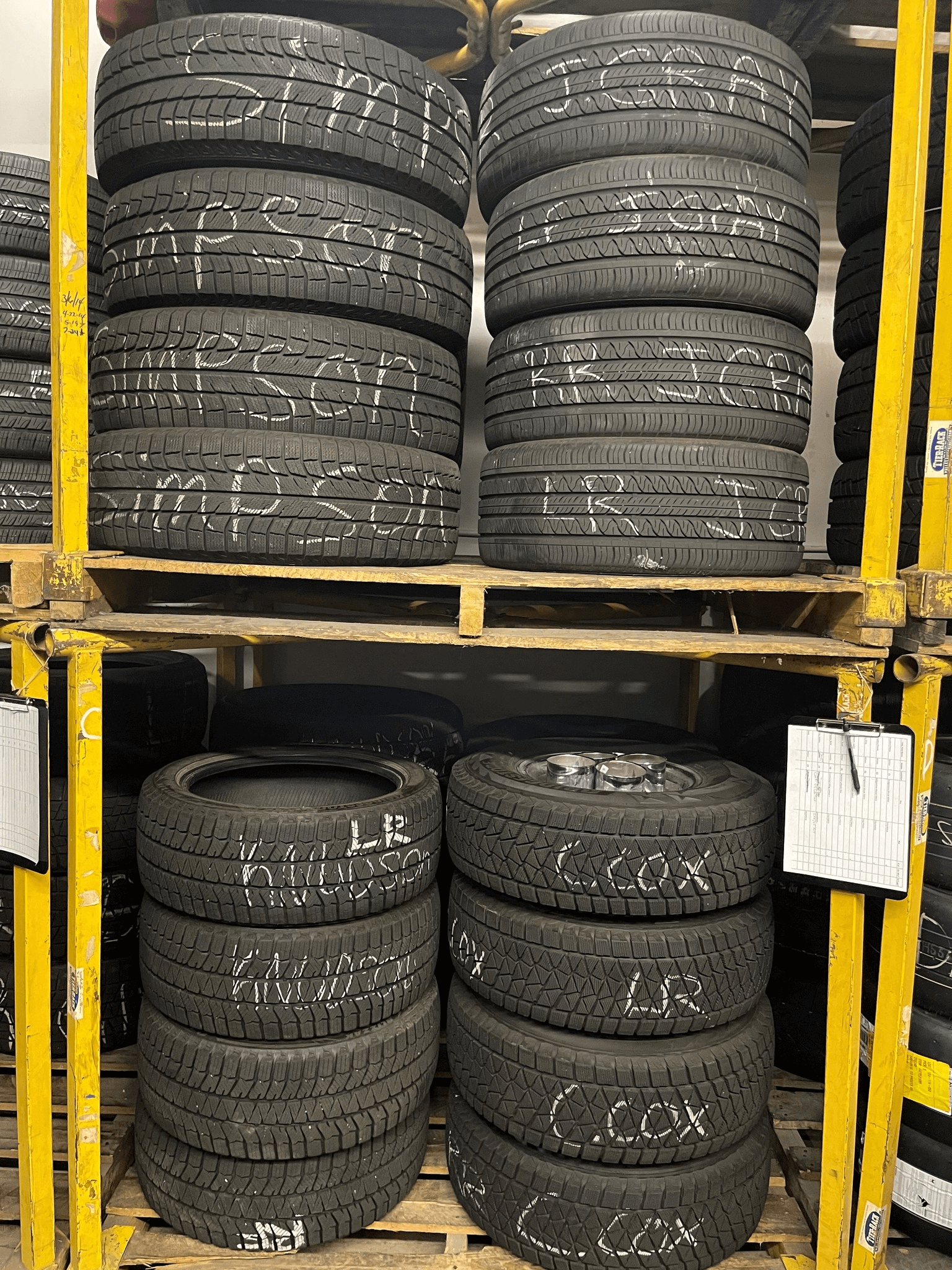 Tires on a storage rack at On-Site Tires
